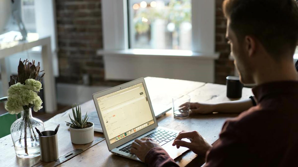 Orange County business professional reviewing a Microsoft 365 admin handoff checklist on a laptop